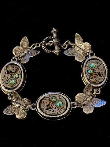 Steampunk Jewelry Butterfly Bracelet - Beautiful upcycled watch parts and vintage style butterfly charms transformed into a one of a kind Bracelet