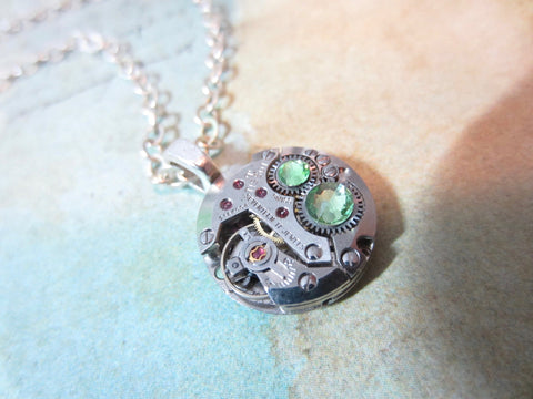 Watch part necklace - Bullet Proof - Steampunk Necklace - Repurposed Art Peridot Swarovski crystals.
